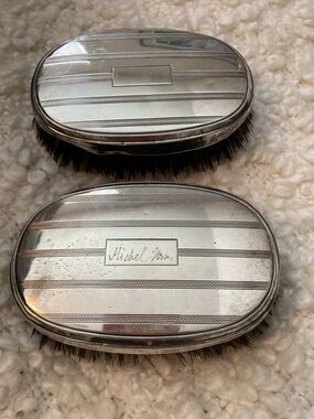 Two antique sterling silver hairbrushes